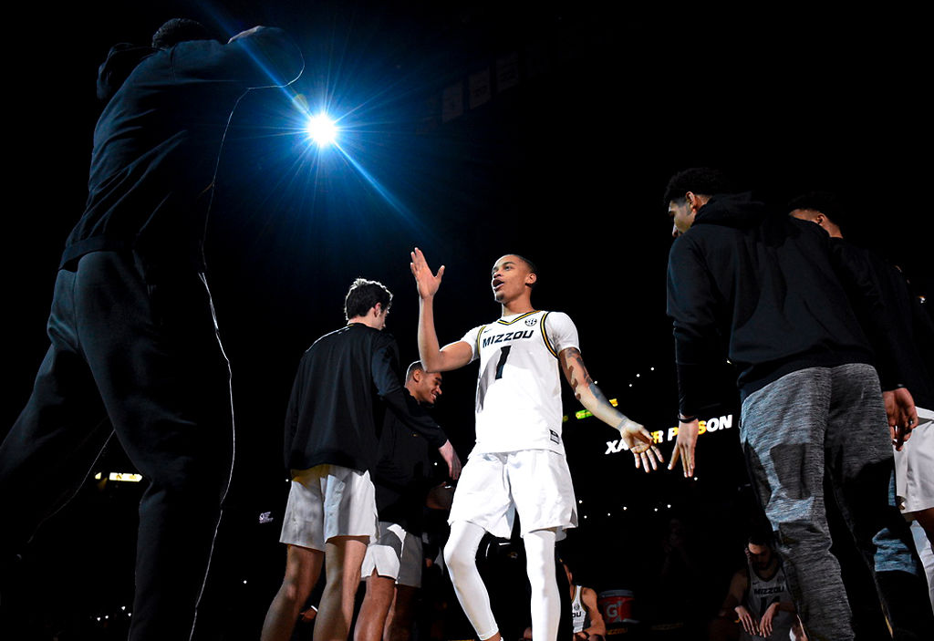 Missouri point guard Xavier Pinson walks onto the court